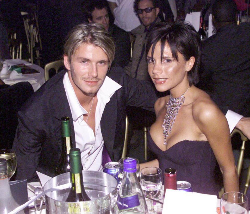 LONDON - OCTOBER 6: British footballer David Beckham and wife pop star Victoria Beckham attend the MOBO Awards at the Royal Albert Hall on October 6, 1999 in London. (Photo by Dave Hogan/Getty Images)