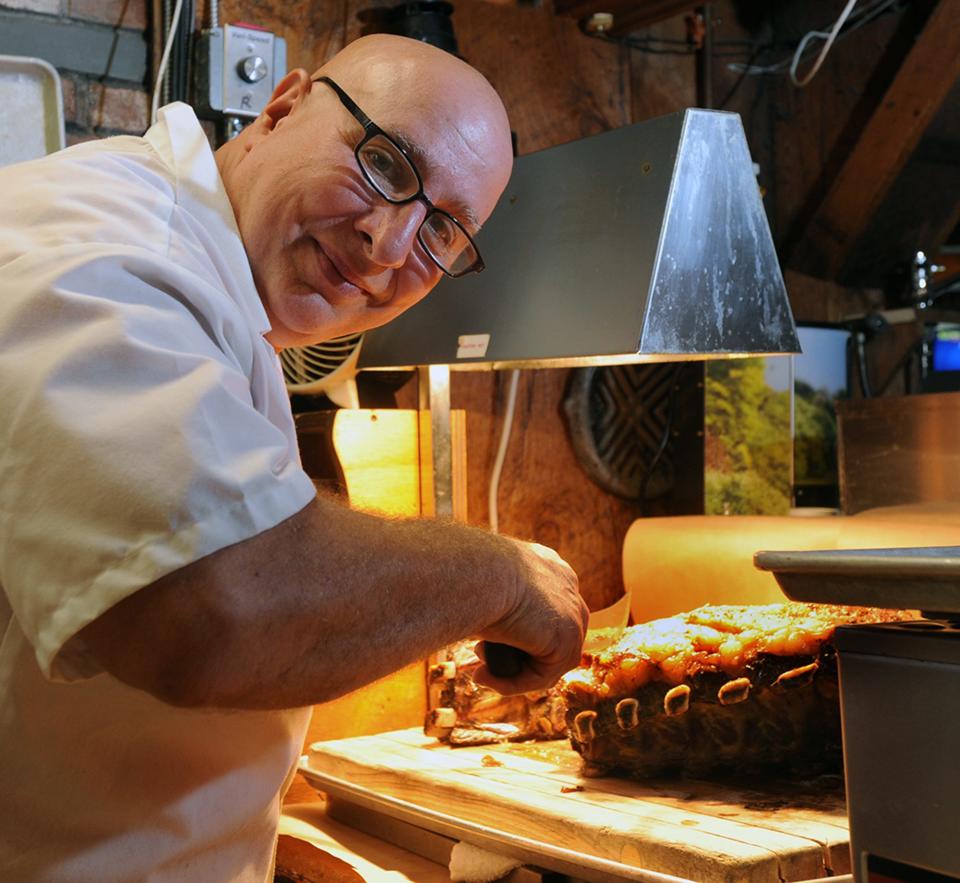 Chef John Quirk with prime rib at New England Steak and Seafood in Mendon, August 13, 2021.