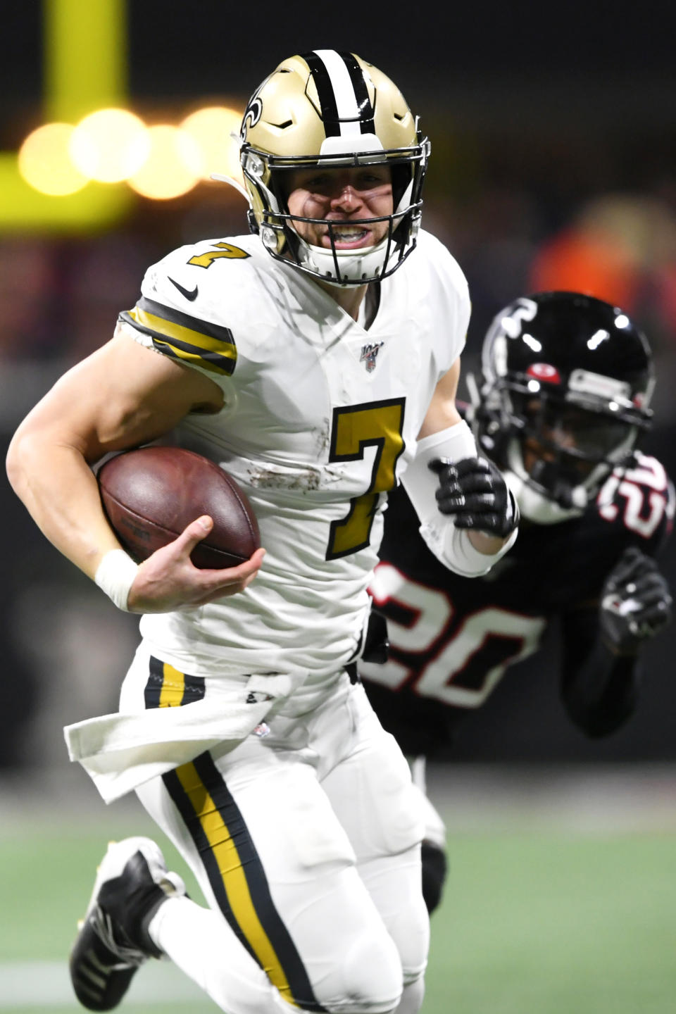 New Orleans Saints quarterback Taysom Hill (7) runs for a touchdown against the Atlanta Falcons during the first half of an NFL football game, Thursday, Nov. 28, 2019, in Atlanta. (AP Photo/John Amis)