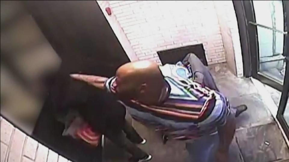 Security video of a man violently attacking a woman in the lobby of an apartment building in Yonkers, New York, on March 11, 2022. The suspect, identified as Tammel Esco, later plead guilty to first-degree assault as a hate crime / Credit: CBS New York
