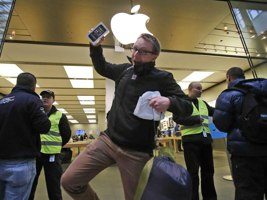 german man buying new iphone at german apple store