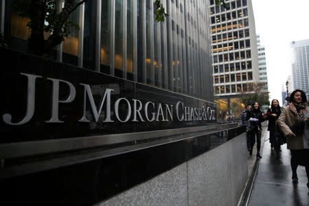 FILE PHOTO: A sign of JP Morgan Chase Bank is seen in front of their headquarters tower in Manhattan, New York, U.S., November 13, 2017. REUTERS/Amr Alfiky/File Photo