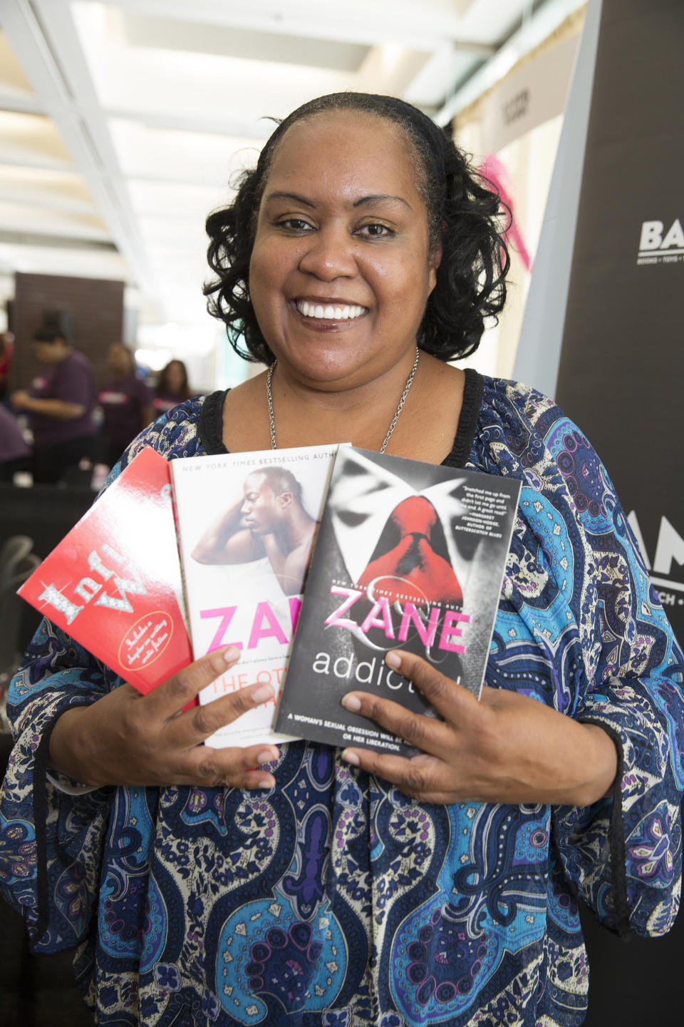 Kristina "Zane" Laferne Roberts poses with fans at the 2015 Women's Empowerment Expo at Cobo Center in Detroit. (Photo: Monica Morgan via Getty Images)