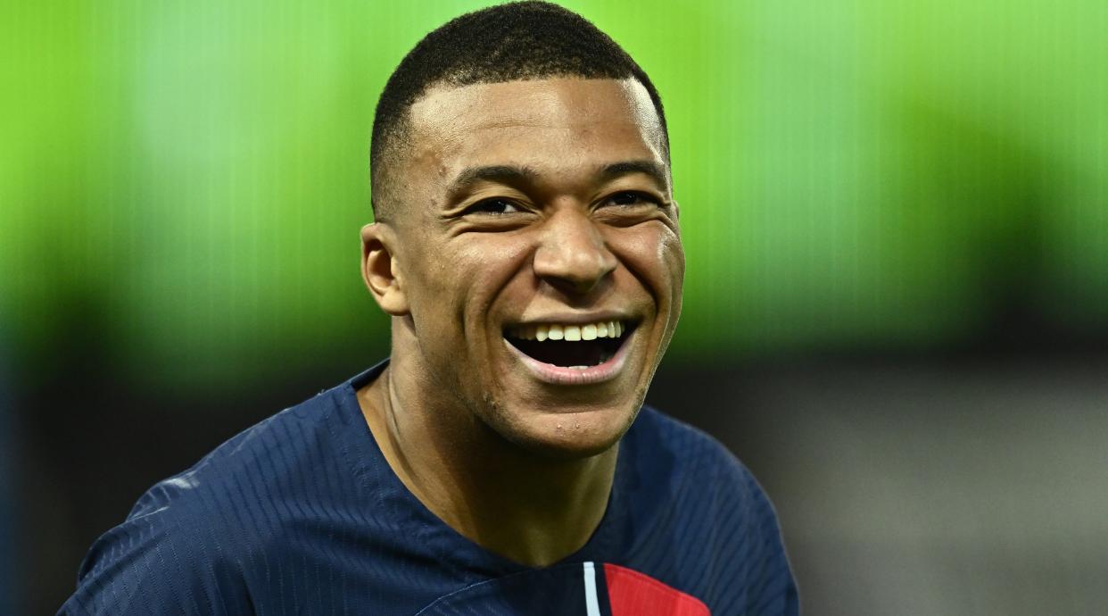  Kylian Mbappe of PSG laughing 