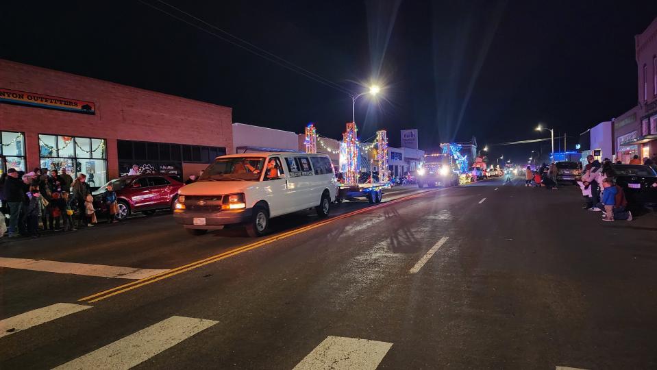 The Parade of Lights makes its way down the street Saturday night in Canyon, Texas.