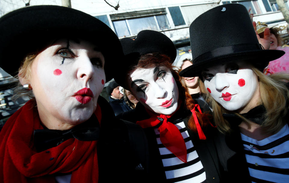 <p>Carnival revellers at the traditional “Rosenmontag” Rose Monday carnival parade in Mainz, Germany, Feb. 12, 2018. (Photo: Ralph Orlowski/Reuters) </p>