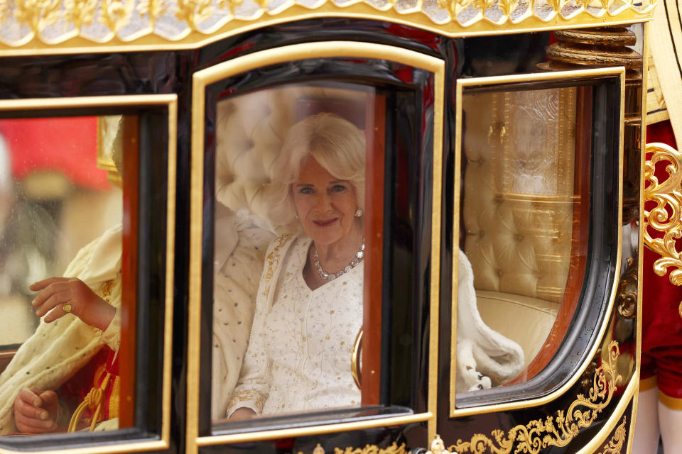 Camilla, Queen Consort travelling in the Diamond Jubilee Coach built in 2012 to commemorate the 60th anniversary of the reign of Queen Elizabeth II. / Credit: / Getty Images