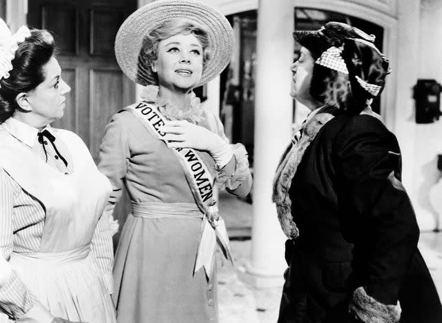 <p>Everett</p> Glynis Johns (center) in 'Mary Poppins'