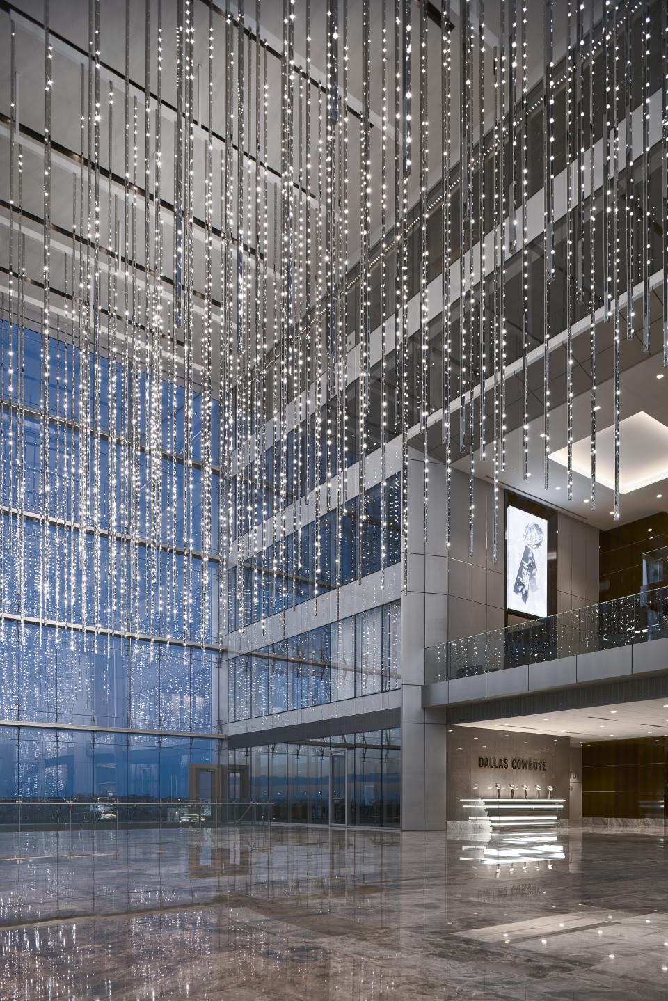 A central atrium in the office building features a light installation by Leo Villareal, Volume (Frisco), that contains 19,200 lights embedded in 160, 40-foot-tall metal rods. Other artworks on display at The Star include pieces by Doug Aitken and Julie Mehretu.