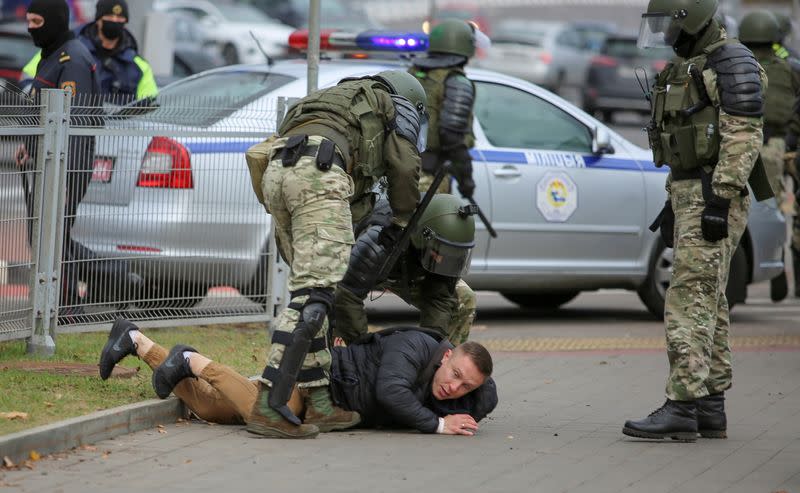 Belarusian opposition supporters hold a rally in Minsk