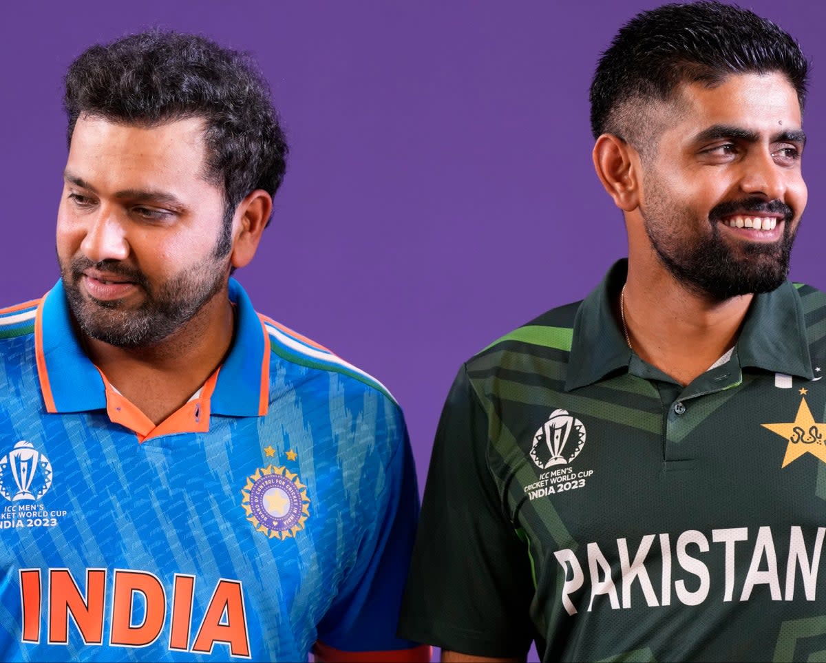 India’s captain Rohit Sharma and Pakistan’s captain Babar Azam during captain’s press conference on the eve of ICC Men’s Cricket World Cup in Ahmedabad (AP)