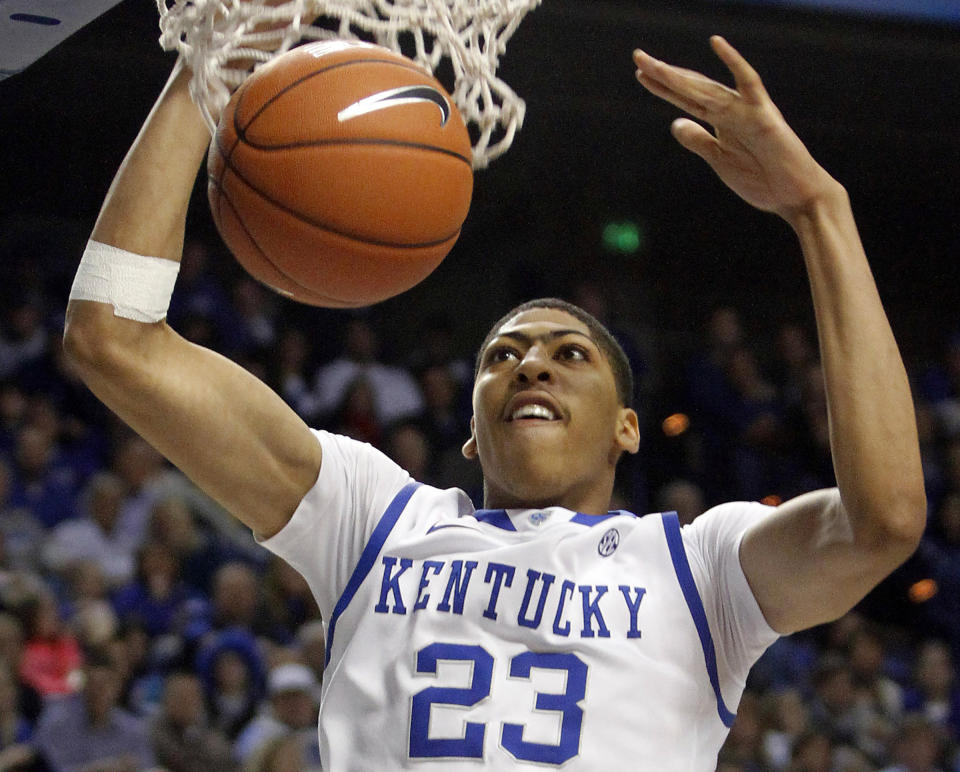 FILE - Kentucky's Anthony Davis dunks the ball during the second half of an NCAA college basketball game against Marist in Lexington, Ky., Friday, Nov. 11, 2011.(AP Photo/James Crisp, File)