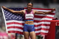 Gold medalist Sydney McLaughlin, of the United States, celebrates after winning the women's 400-meter hurdles at the 2020 Summer Olympics, Wednesday, Aug. 4, 2021, in Tokyo, Japan. (AP Photo/Petr David Josek)