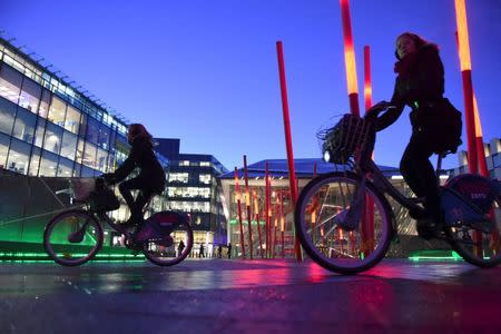 Cyclists ride dublinbikes in Dublin's docklands area, Ireland February 17, 2016. REUTERS/Clodagh Kilcoyne