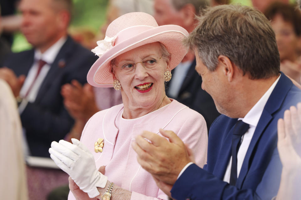 CORRECTS SPELLING OF NAME The Danish Queen Margrethe and the German vice Chancellor Robert Habeck attend the inauguration of the new museum Flugt, in Oksboel, Denmark, Saturday, June 25, 2022. Flugt — Refugee Museum of Denmark was created on the site of a camp in Oksboel, a town in southwestern Denmark, that housed up to 100,000 refugees from Germany in the postwar years. Flugt — which means escape in Danish — also tells the story of immigrants from Iran, Lebanon, Hungary, Vietnam and elsewhere who fled their homelands and found shelter in the Scandinavian country. (Bo Amstrup/Ritzau Scanpix via AP)