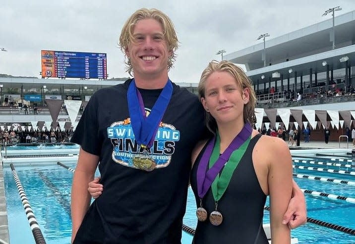 Nordhoff's Quin Seider and sister Melina Seider pose with their medals at the CIF-Southern Section Division 3 Swimming Championships on Friday at Mount San Antonio College. Quin won the 100 freestyle and 200 freestyle titles and Melina took fourth in the 500 freestyle and sixth in the 200 freestyle.
