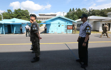 South Korean army soldiers stand guard at the border village of Panmunjom in the Demilitarized Zone, South Korea, September 7, 2018. Ahn Young-joon/Pool via REUTERS