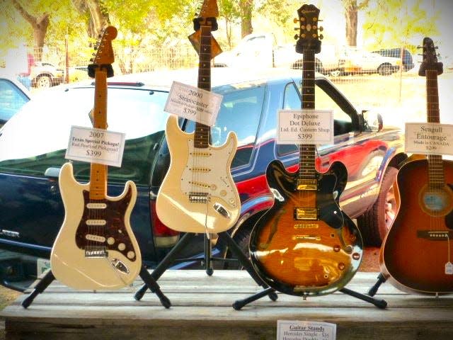 Shop for guitars while gazing at pristine vintage cars this Sunday at Renninger's Flea Market & Antique Center.