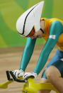 ATHENS - AUGUST 20: Anna Meares of Australia celebrates after finishing first and winning the gold medal in the women's track cycling 500 metre time trial final on August 20, 2004 during the Athens 2004 Summer Olympic Games at the Olympic Velodrome within the Olympic Sports Complex in Athens, Greece. (Photo by Donald Miralle/Getty Images)