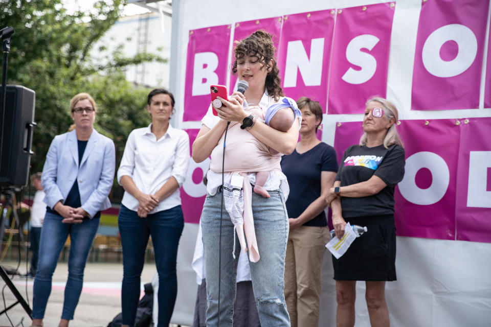 People gather in Pack Square Park to react to the recent Supreme Court ruling regarding the overturning of Roe v. Wade on June 24, 2022.