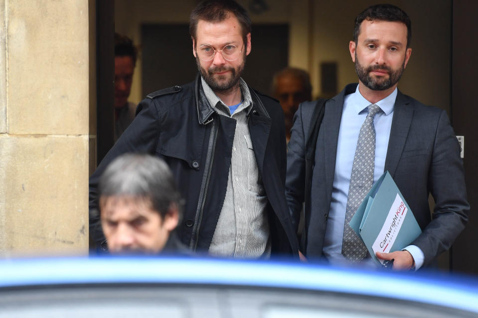 Ex-Kasabian singer Tom Meighan (left) leaving Leicester Magistrates' Court where he was sentenced to carry out 200 hours of unpaid work for assaulting former fiancee Vikki Ager.