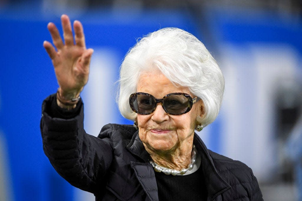 Detroit Lions former Principal Owner Martha Firestone Ford waves before the game against the Cincinnati Bengals at Ford Field on October 17, 2021 in Detroit, Michigan