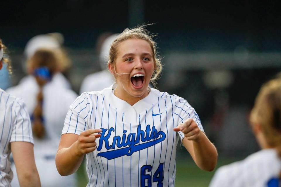 Lexington Catholic’s Ava Emmert celebrates a run scored against Bryan Station to take the lead during their game on March 23, 2023. Emmert is one of two LexCath players committed to Kentucky.