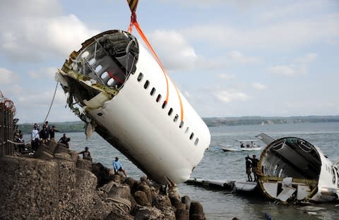 Lion Air Flight 904 crashed in 2013 - Credit: 2013 AFP/SONNY TUMBELAKA