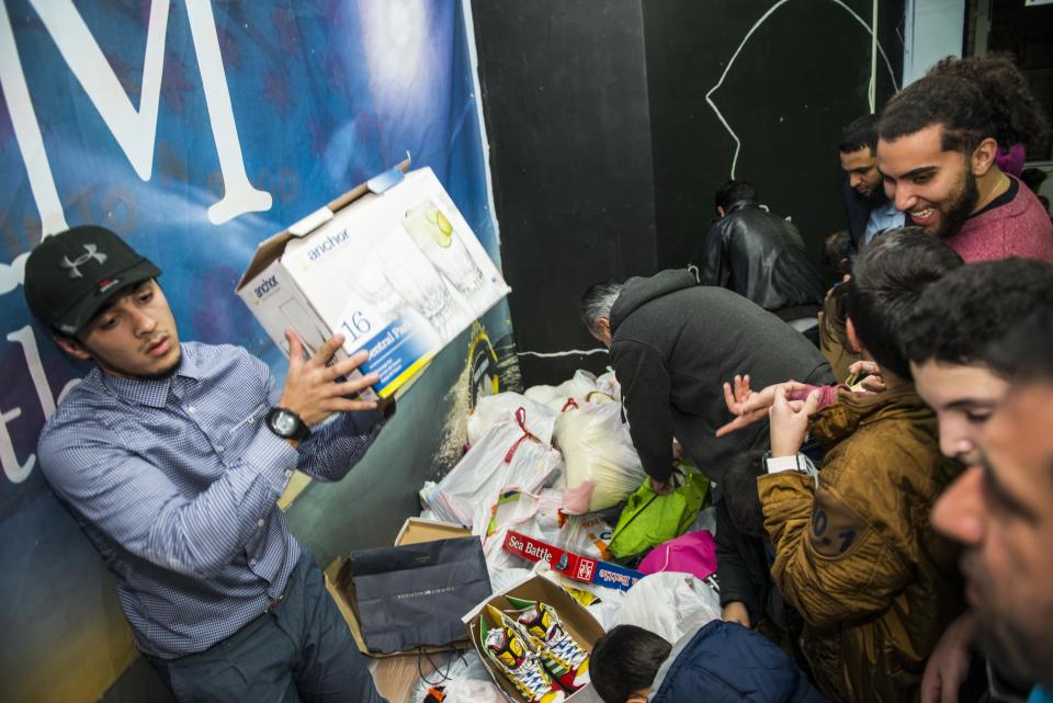 UNION CITY, NJ - DECEMBER 20:  Syrian refugees are welcomed to the United States at a party in their honor at the North Hudson Islamic Educational Center in Union City, New Jersey on Sunday Dec. 20, 2015. (Photo by Damon Dahlen, Huffington Post) *** Local Caption *** 