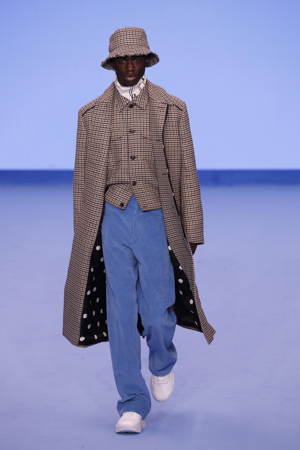 A model presents a creation for the Paul Smith Mens Fall/Winter 2020-2021 fashion collection presented in Paris, Sunday Jan. 19, 2020. (AP Photo/Francois Mori)