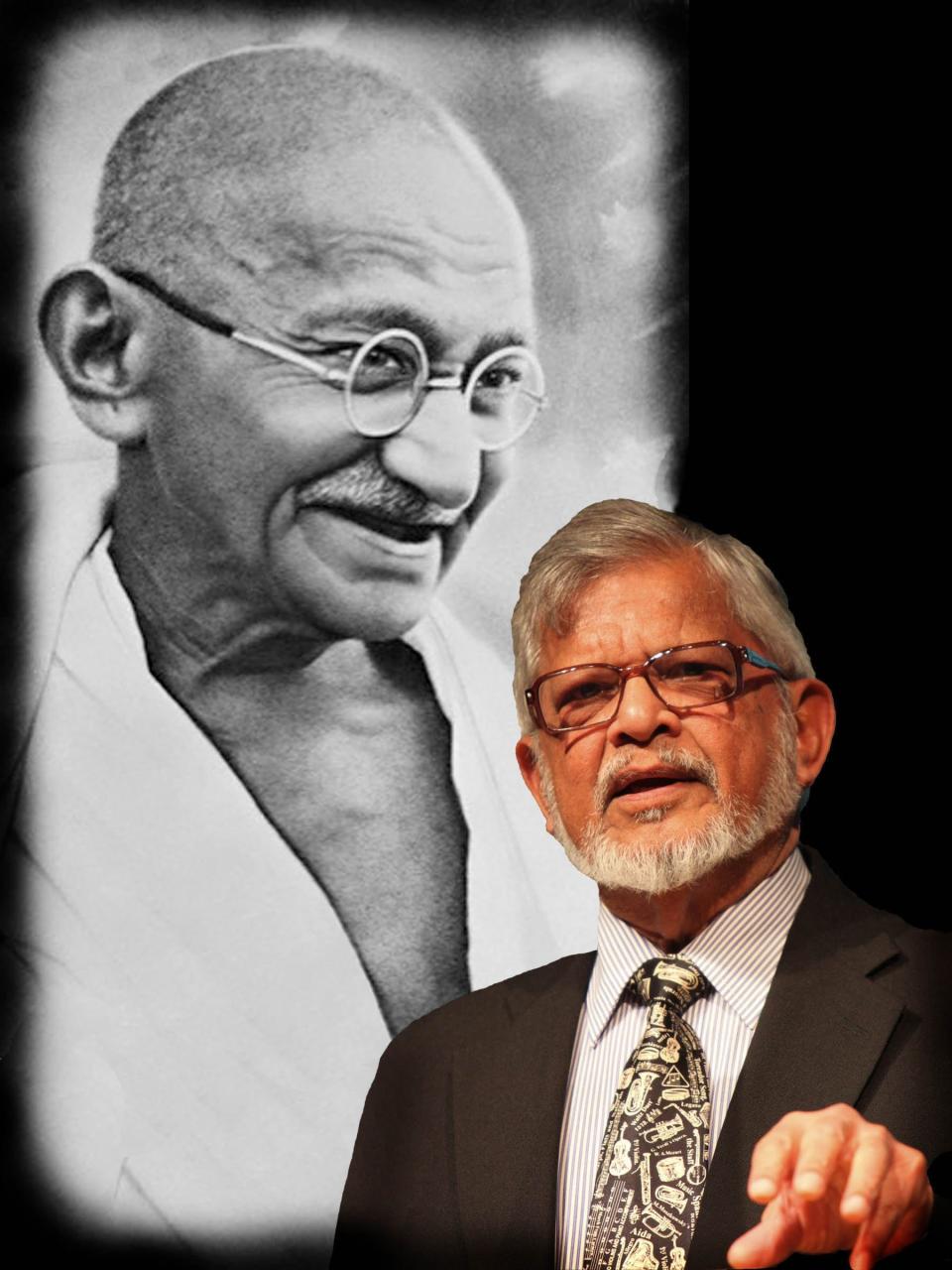 Peace activist and author Arun Gandhi speaks in front of a photo of his grandfather Mahatma Gandhi, leader of the Indian independence movement and proponent of nonviolent civil disobedience. The younger Gandhi served as the keynote speaker at a Girls Inc. of Jacksonville event in 2017.