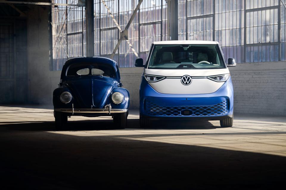 A first-gen VW Beetle and the new ID Buzz electric minivan reprise the automaker's "Think Tall" image.