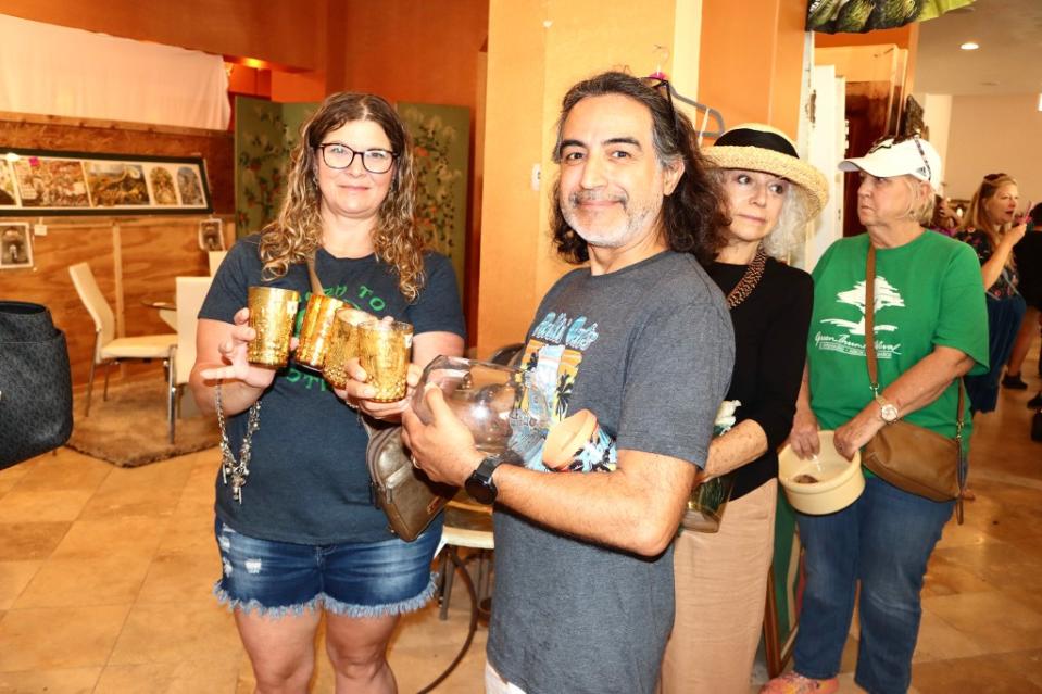 Customers smile for the camera at the crowded Alley estate sale on Tuesday. Landon Aldo Paci/MEGA for NY Post