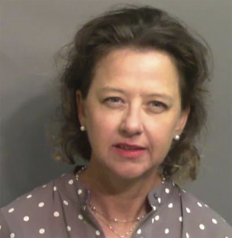 This jail booking photo provided by Glynn County Sheriff’s Office, shows Jackie Johnson, the former district attorney for Georgia’s Brunswick Judicial Circuit, after she turned herself in to the Glynn County jail in Brunswick, Ga, on Wednesday, Sept. 8, 2021.