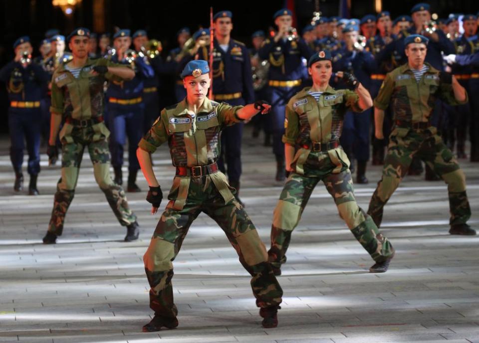 Dancers and musicians of the paratroopers band perform during the military music festival in September.