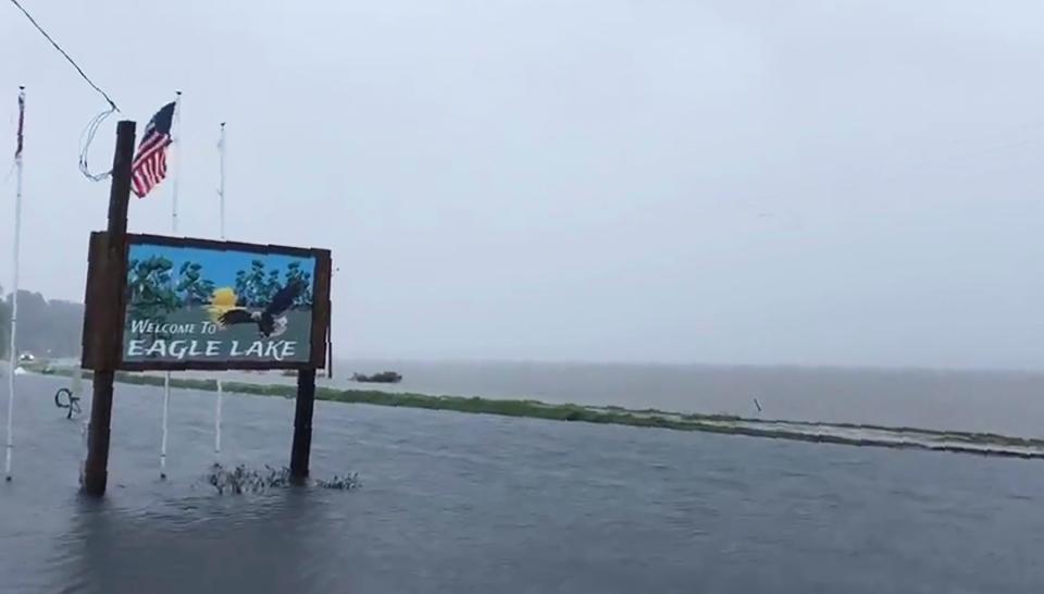 The flooded welcome sign at the entrance to Eagle Lake community near Vicksburg, Miss., on July 14, 2019.