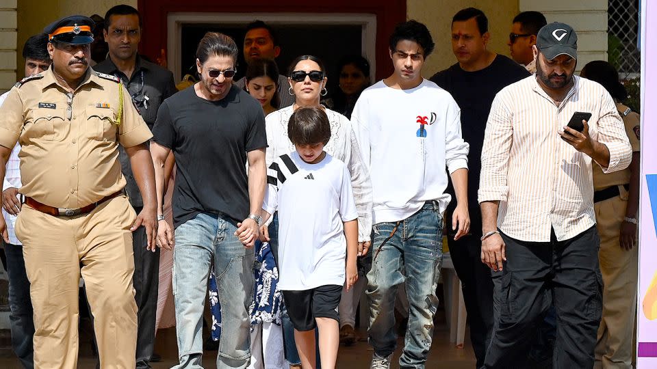 Bollywood actor Shah Rukh Khan leaves a polling booth with his family after casting his vote in Mumbai on May 20, 2024. - Sujit Jaiswal/AFP/Getty Images