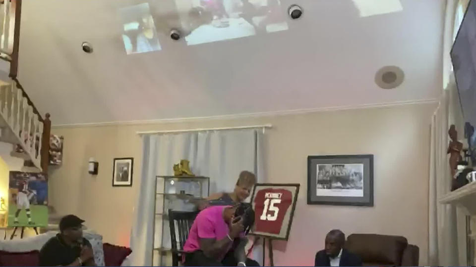 In this still image from video provided by the NFL, Xavier McKinney reacts after being selected by the New York Giants during the second round of the NFL football draft, Friday, April 24, 2020. (NFL via AP)