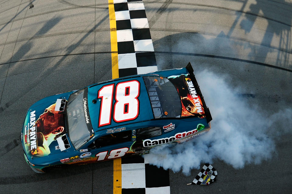 TALLADEGA, AL - MAY 05: Joey Logano, driver of the #18 GameStop Toyota, perfoms a burnout to celebrate after winning the NASCAR Nationwide Series Aaron's 312 at Talladega Superspeedway on May 5, 2012 in Talladega, Alabama. (Photo by Jared C. Tilton/Getty Images)