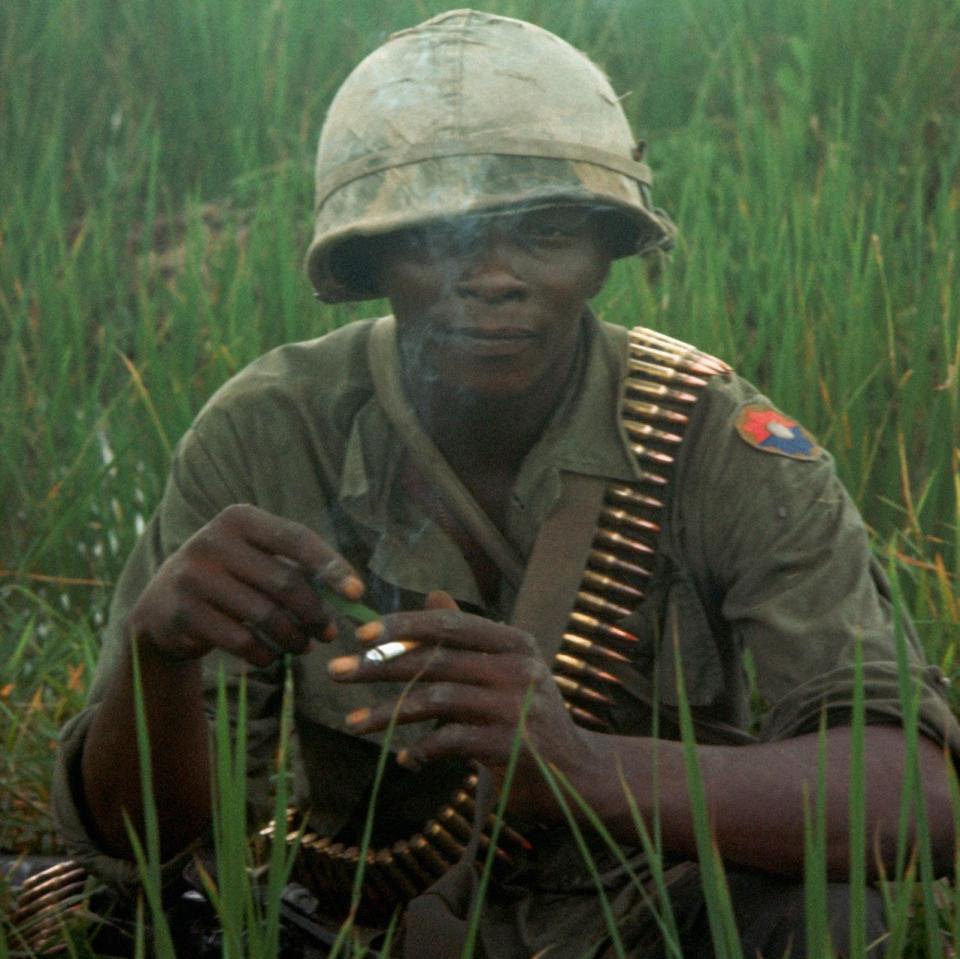 A machine gunner from the 9th Division - Corbis