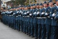 <p>A military parade marches in downtown Ottawa for a memorial service for Britain's Queen Elizabeth II on September 19, 2022. - Canadians said goodbye to Queen Elizabeth II with a parade through the capital Ottawa and smaller tributes across the nation -- a few hours after her London funeral.</p> <p>(Photo by DAVE CHAN/AFP via Getty Images)</p> 