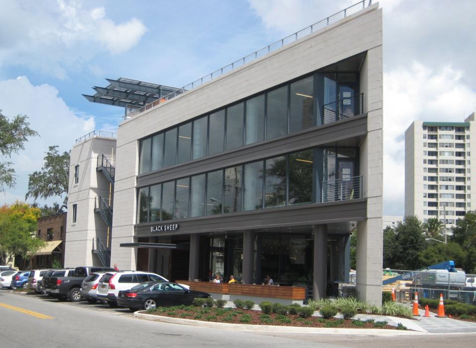 The former Black Sheep restaurant featuring a  rooftop lounge is an iconic landmark in the Five Points neighborhood.