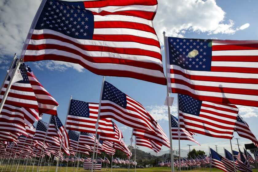 Glendora, CA - July 03: American flags displayed at Glendora Rotary's Field of Heroes in the honor of military personnel, veterans, first responders and health care heroes on the grounds of Sunflower Intermediate School on Saturday, July 3, 2021 in Glendora, CA. (Irfan Khan / Los Angeles Times)