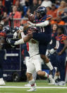 UTSA safety Kelechi Nwachuku (11) breaks up a pass intended for Western Kentucky wide receiver Josh Sterns (9) during the second half of an NCAA college football game in the Conference USA Championship, Friday, Dec. 3, 2021, in San Antonio. (AP Photo/Eric Gay)