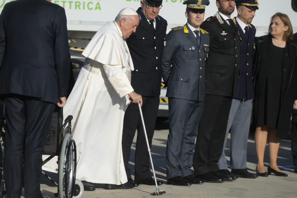 Pope Francis arrives to board his flight to Budapest at Rome's international airport in Fiumicino, Italy, Friday, April 28, 2023. The Pope is on his way to a three-day pastoral visit to Hungary. (AP Photo/Gregorio Borgia)