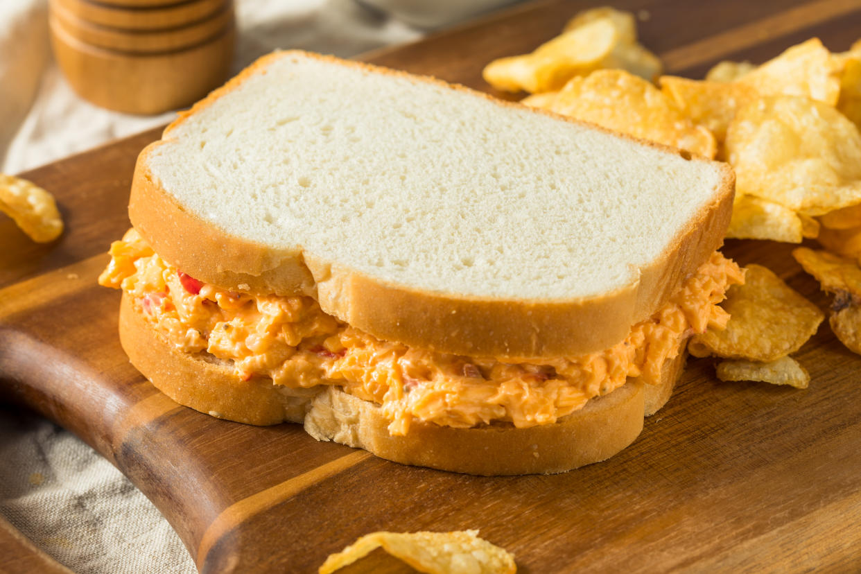 For just $1.50 at the Augusta National Golf Club, you can get a pimento cheese sandwich. But what is pimento cheese and how did it become a staple at the Masters? (Photo: Getty Creative)