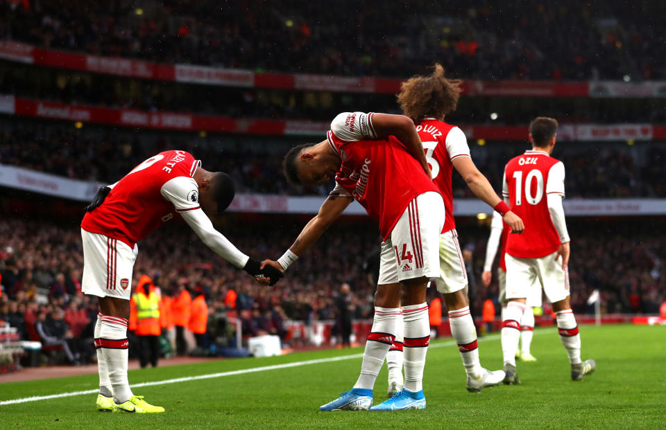 LONDON, ENGLAND - NOVEMBER 02: Pierre-Emerick Aubameyang of Arsenal celebrates scoring his teams first goal during the Premier League match between Arsenal FC and Wolverhampton Wanderers at Emirates Stadium on November 02, 2019 in London, United Kingdom. (Photo by Chloe Knott - Danehouse/Getty Images)