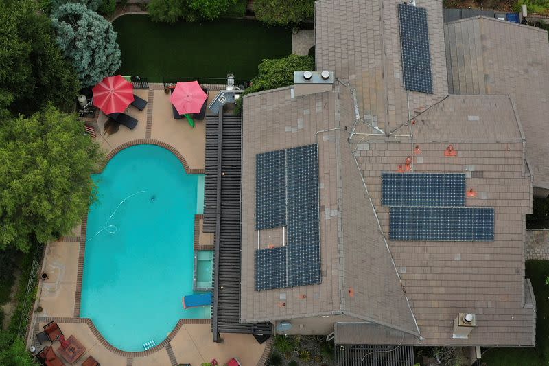 FILE PHOTO: Solar panels are seen on rooftops amid the coronavirus disease (COVID-19) outbreak, in Santa Clarita, near Los Angeles