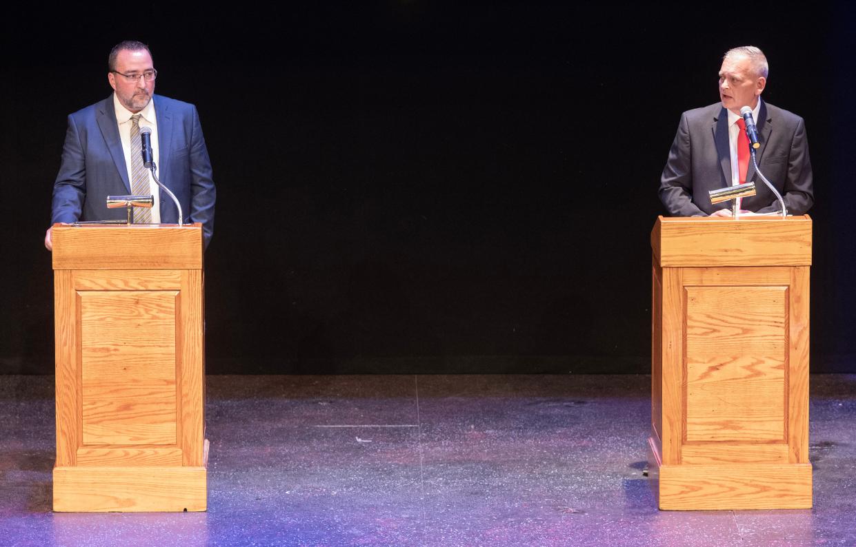 Democratic candidate for Canton Mayor William V. Sherer II, left, and Republican candidate Roy Scott DePew debate Oct. 10 at The Future of Canton 2023 Mayoral Debate held at the Canton Cultural Center Theater.