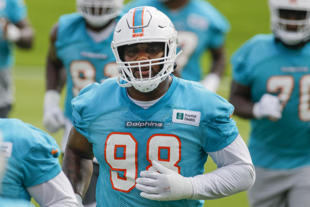 Dolphins orange jersey for practice player of the day tracker